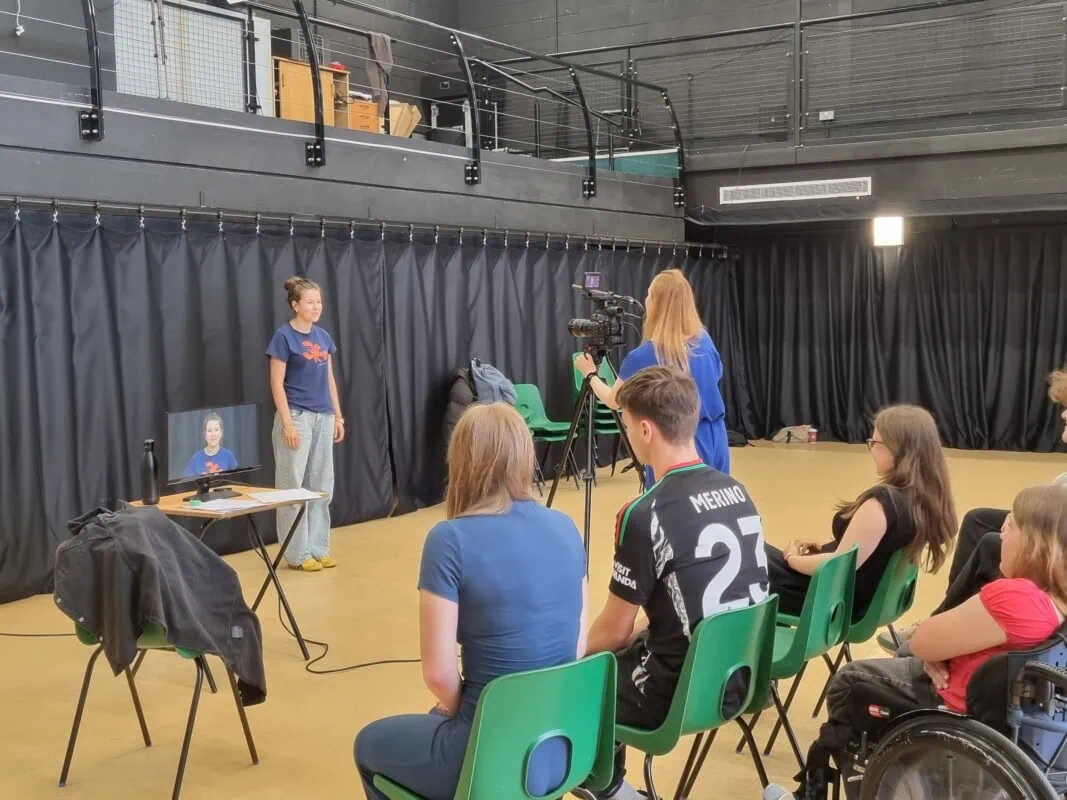 Students performing in drama studio