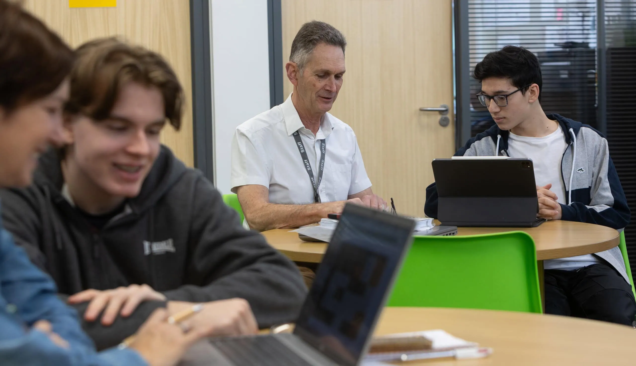 malcolm, jo and jake in the study centre using assistive technology
