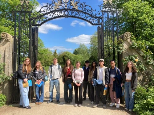 Students standing at the gates of st Hildas